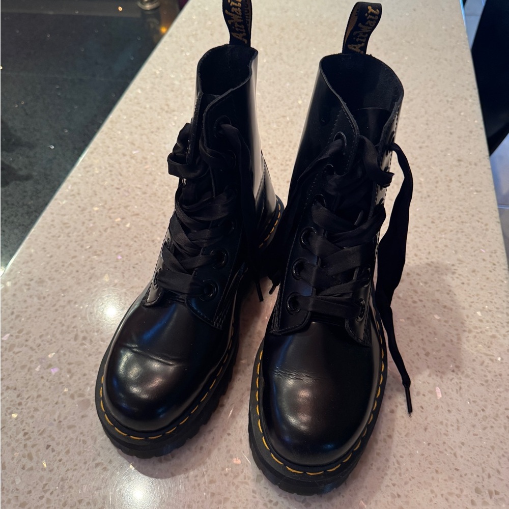Dr. Martens Black Combat Boots with Lace-Up Design